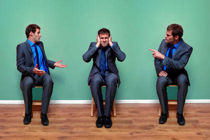 Businessman arguing with himself